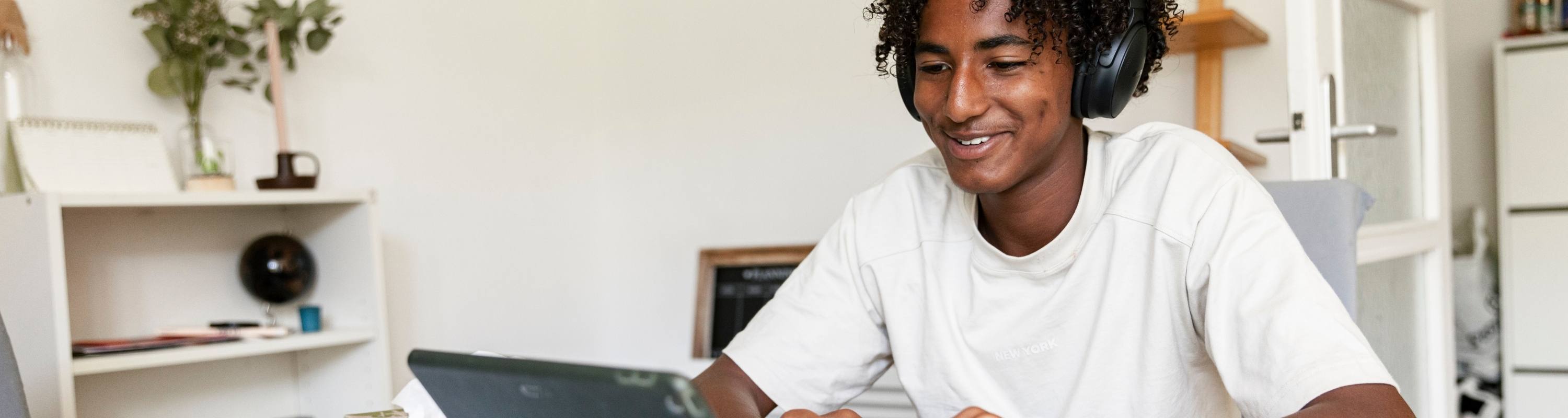 Student using a laptop to learn online