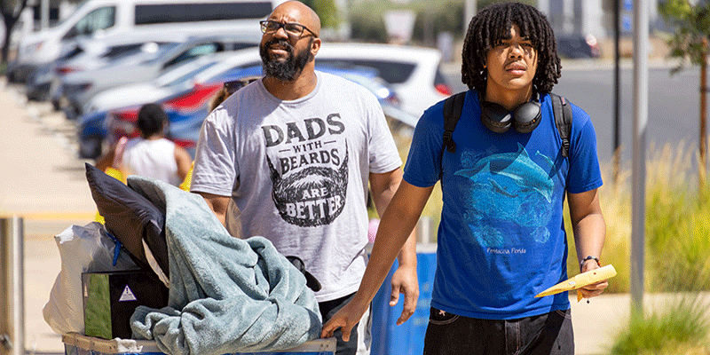 father and son walking